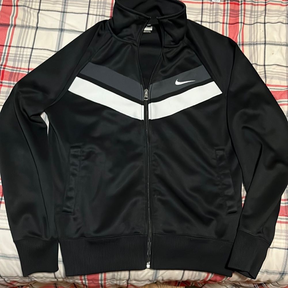 Black with grey and white stripe Nike jacket